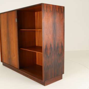 Rosewood cabinet by Arne Vodder for Sibast one sliding door open front view